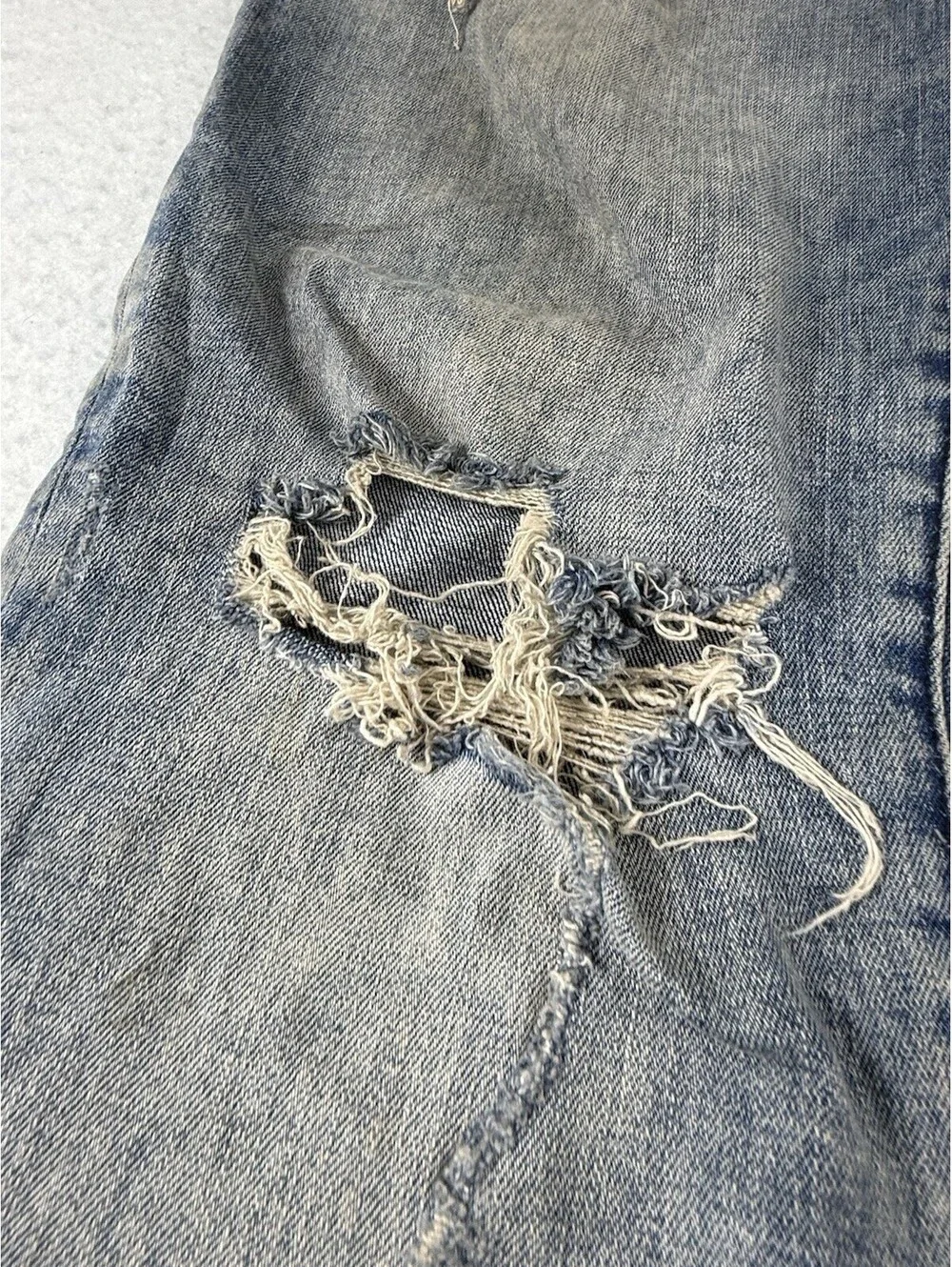 True Religion Men’s Blue Light Wash Relaxed Slim Distressed Mid Rise Jeans